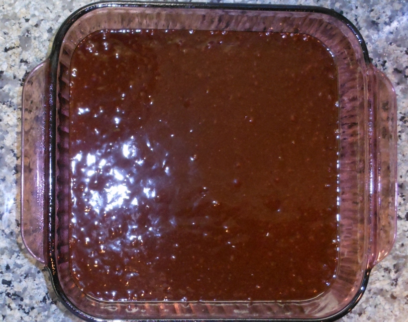 I poured the brownie mix into a greased Pyrex pan (my baking pan of choice).